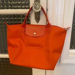 Orange longchamp model depose le pliage tote handbag